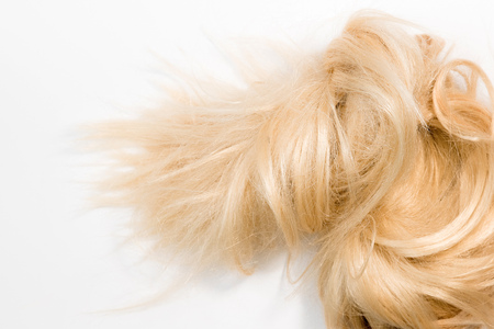 Blond natural hair extensions isolated on white background.の写真素材