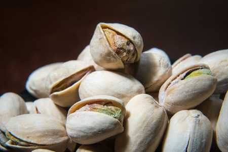 Close up of pile of pistachios nuts. Food mix background, copy space, bannerの写真素材