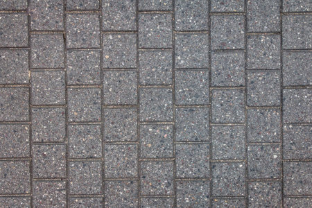 Concrete tile texture. City pavement background. Abstract stone brick pattern. Street sidewalk...