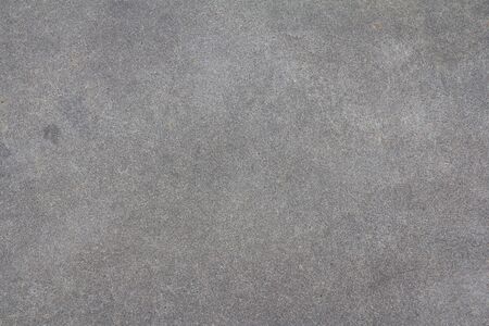 Sanded cement background. Smooth concrete surface. Polished grey stone texture.の写真素材