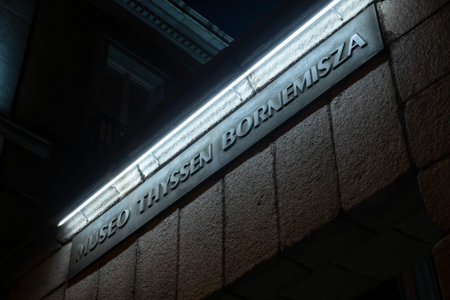 MADRID, SPAIN - December, 2019: Entrance to Thyssen - Bornemisza museum at night downtown Madrid....