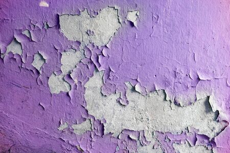 Close up of old stucco cracks on the wall. Weathered paint cracks on plaster. Cracked wall background. Abstract Web Bannerの写真素材