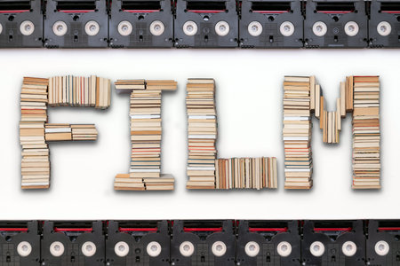 Film letters with analog vintage mini DV cassette tapes used for filming back in a day. Pattern made...