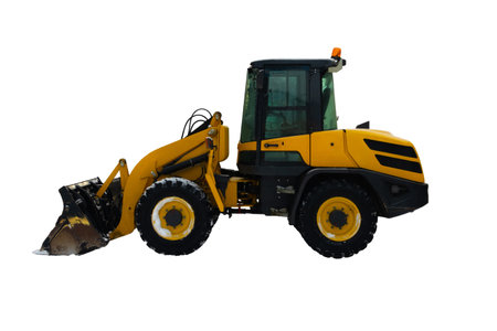 Heavy duty yellow earth mover isolated on white background. Industrial excavator used in...