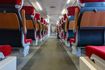 Empty train seats. No people inside the train wagon.の写真素材