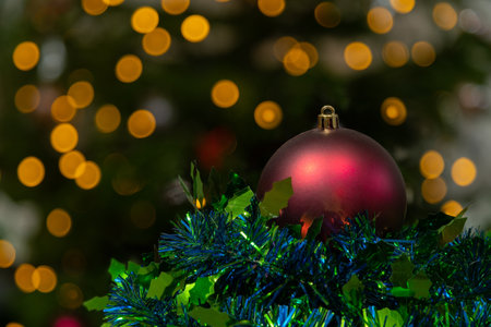 Red and white christmas hat in black background. Santa claus cap on the plain dark background.の写真素材