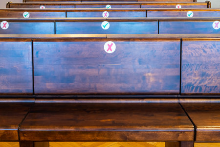Empty rows of wooden bench in the courtroom or church. Nobodyの写真素材
