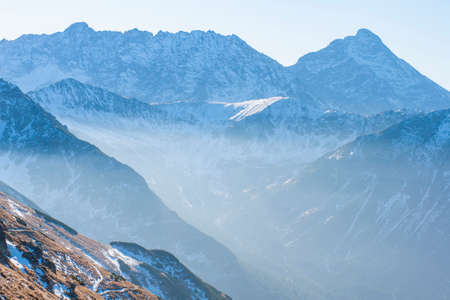 Subtle mist veil in tall Tatra mountains, Kasprowy Wierchの写真素材