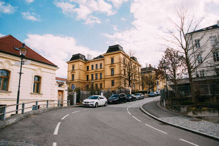 Austria/ Melk, 8 march 2020 photo of old yellow house during sunny dayのeditorial素材