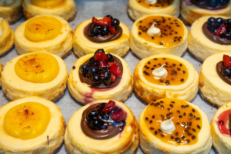Close up shot of some delicious mini cakes with fruits at the street market.の写真素材