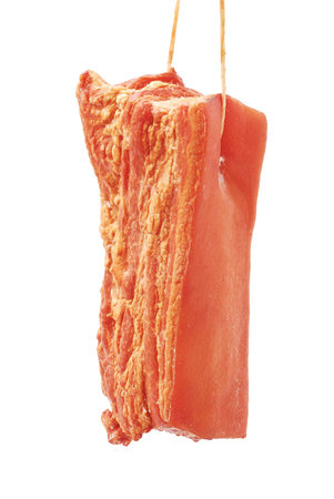 smoked ham isolated on whiteの写真素材