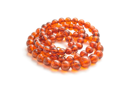 natural amber necklace on whiteの写真素材