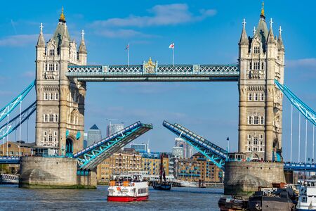 Close-up view of the famous landmark of London Tower Bridge with open gates in England, UKの写真素材