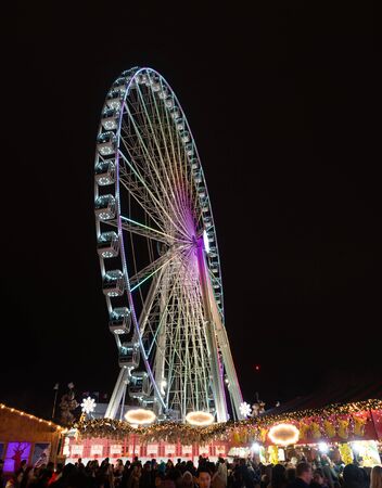 London, England UK - December 26,2019; Big ferris amusement wheel at night in winter wonderland in Hyde Park in holiday timeのeditorial素材