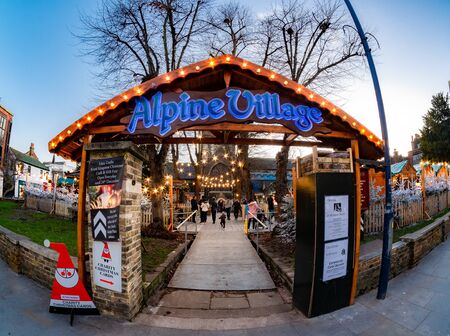 London, England, UK - December 13, 2019: Christmas Market , Alpine Village outdoors in the town square of Kingstone Upon Thames in evening lights in winter holiday timeのeditorial素材