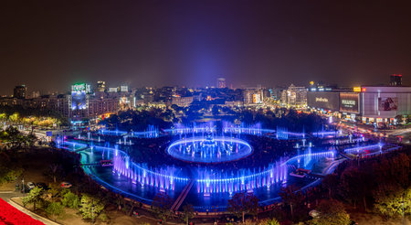 Bucharest, Romania - October 19, 2018: Aerial view of Bucharest capital at night with the famous artistic fountain created by Apa Novaのeditorial素材