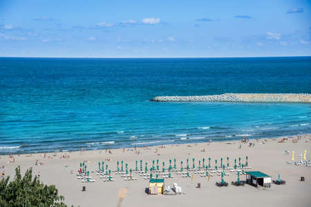 Aerial view of the beach in Constanta with blue black sea water in summer holiday in Romaniaのeditorial素材