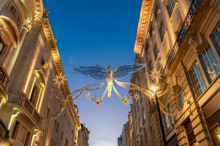 Christmas decoration on the streets of the city of Paris, France.の写真素材