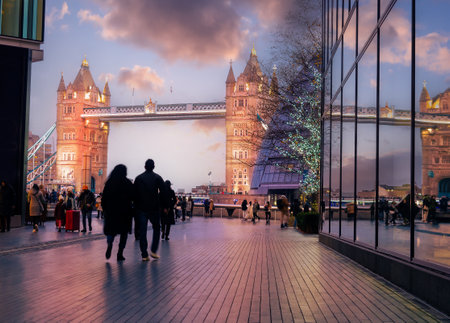 Tower Bridge and people walking in London.の写真素材