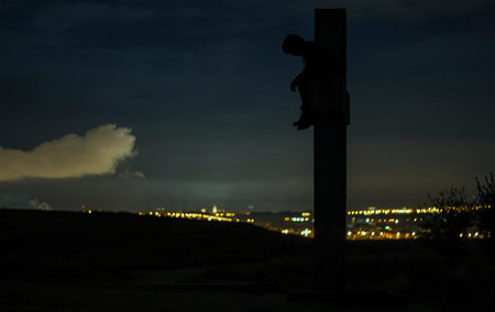 shadow of a person sitting in the background the cityの写真素材