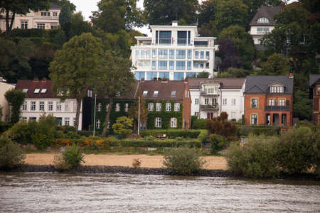 Houses and villas near the river in Hamburgの写真素材