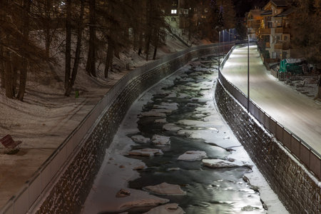 Scenic night time views of Zermatt (and frozen river), Switzerland