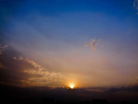 Colorful sunset with cloudy skyの写真素材