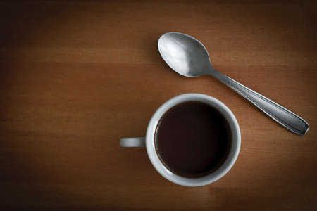 Coffee cup and a teaspoonの写真素材
