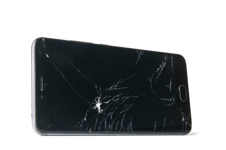 Broken smartphone isolated on white background