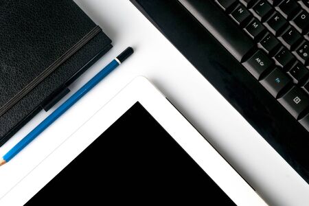 White desktop with creative objectsの写真素材