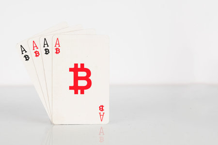 Bitcoin concept: four of a kind of bitcoin playing cards