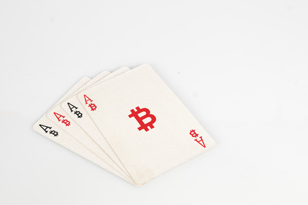 Bitcoin concept: four of a kind of bitcoin playing cardsの写真素材