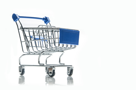 Shopping cart with blue details isolated on white background with copy spaceの写真素材