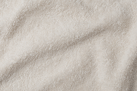 Fluffy clear brown towel top view, texture backgroundの写真素材