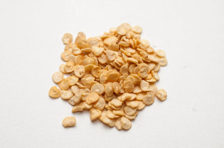 Seeds of various chili peppers on white backgroundの写真素材