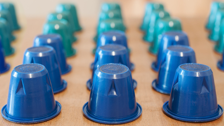 Rows of coffee capsules for espresso coffee machine, 16:9 orizontal shotの写真素材