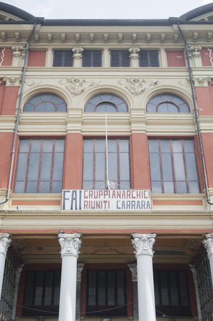 CARRARA, ITALY - JUNE 16, 2019: the seat of the Italian federation of anarchists, recognized as the most important in the world. The venue is contained in the Politeama Giuseppe Verdi, one of the best Italian theaters.のeditorial素材
