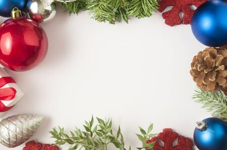 Unusual christmas background with decorations and big white space for textの写真素材