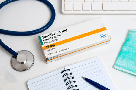 Carrara, Italy - March 23, 2020 - A pack of Tamiflu (oseltamivir), a drug used in some Italian...