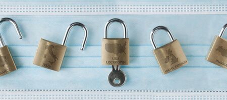 End of USA lockdown due to covid.19: a series of locks with the shape and name of a country to represent where the lockdown it's over and where's notの写真素材