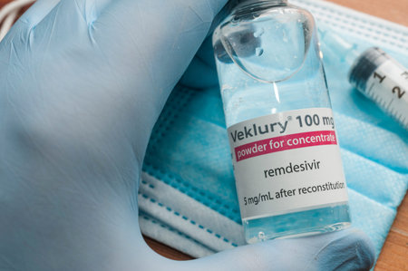 Carrara, Italy - October 26, 2020 - Doctor hold a vial of Remdesivir. Remdesivir is an antiviral...