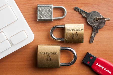 Data protection concept: three locks, an usb key and a pair of key on a wooden table.