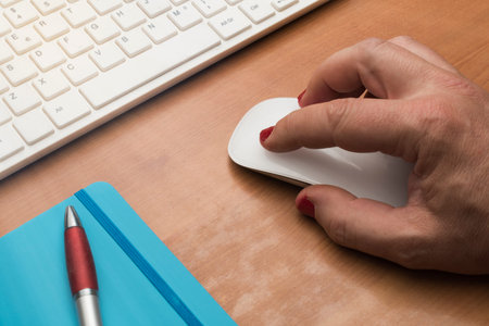 Gender equality concept: man with nail polish working at pc