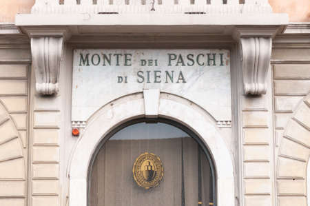 Pisa, Italy - March 24, 2021 - Sign in iron and marble of the Italian bank Monte dei Paschi di Sienaのeditorial素材