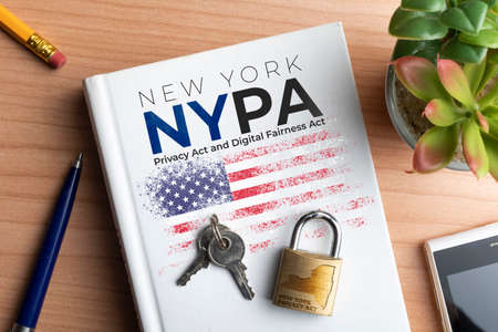NYPA (new york privacy act) concept: book cover with a lock and some keys and text for the New York Privacy Act and the Digital Fairness Actの写真素材
