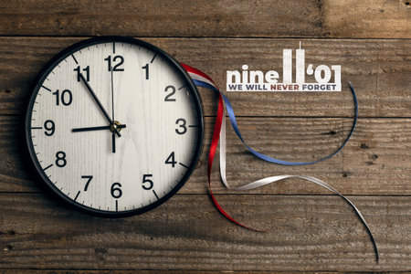 Clock shows the numbers 9 11 in memory of September 11, 2001. Patriot day 2022