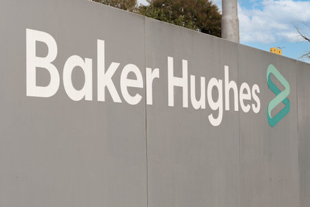Massa, Italy - June 4, 2022 - Sign of the US oil services company Baker Hughes in the Italian plant in Massa.のeditorial素材