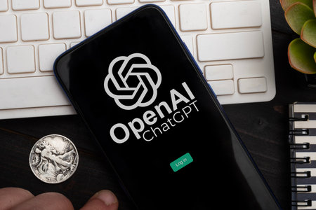 Carrara, Italy - June 5, 2023 - Man using the OpenAI ChatGpt appのeditorial素材