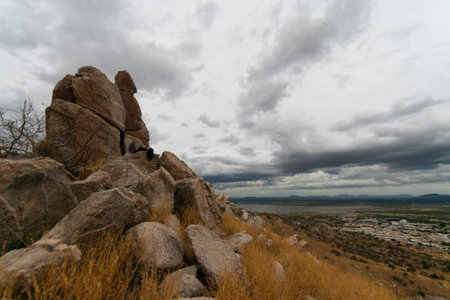 Hike to the top of the mountain on a cloudy day.の写真素材