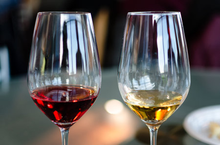 Wine tasting experience in Langhe (Italy) with two glasses of Moscato and Brachetto on a table